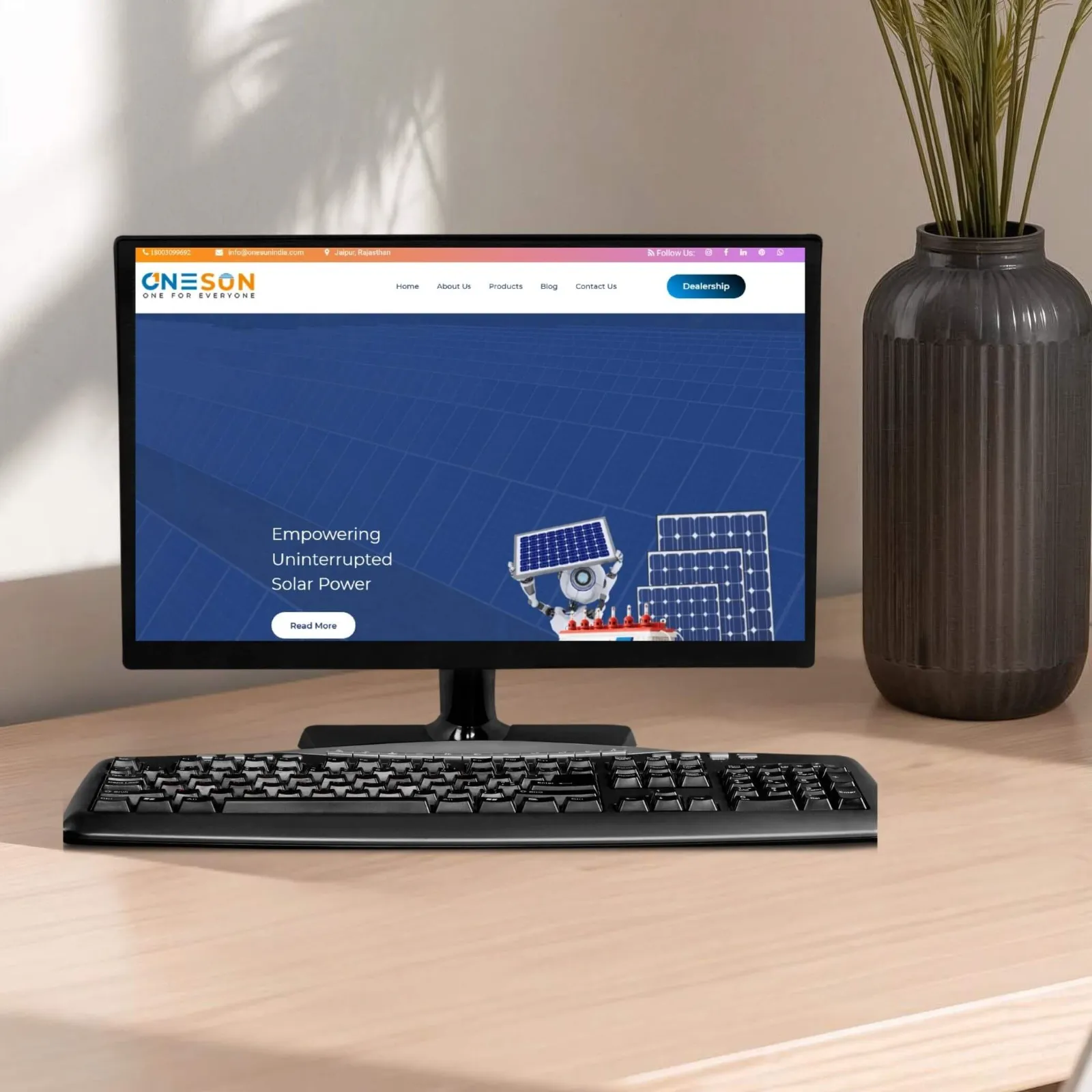 One Sun Power System Pvt. Ltd. website designed by CoregenX, shown on a desktop monitor